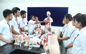Students at Harsha College of Nursing learning about nursing skills.