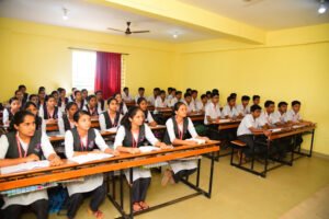 An image of students learning at Raghavendra College of Nursing in Davangere, India.