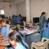 Students at Raman College of Nursing Mysore learning about nursing care.