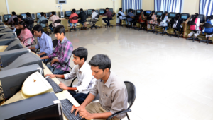 Students studying and interacting on the vibrant campus of Rajarajeswari College of Engineering Bangalore.